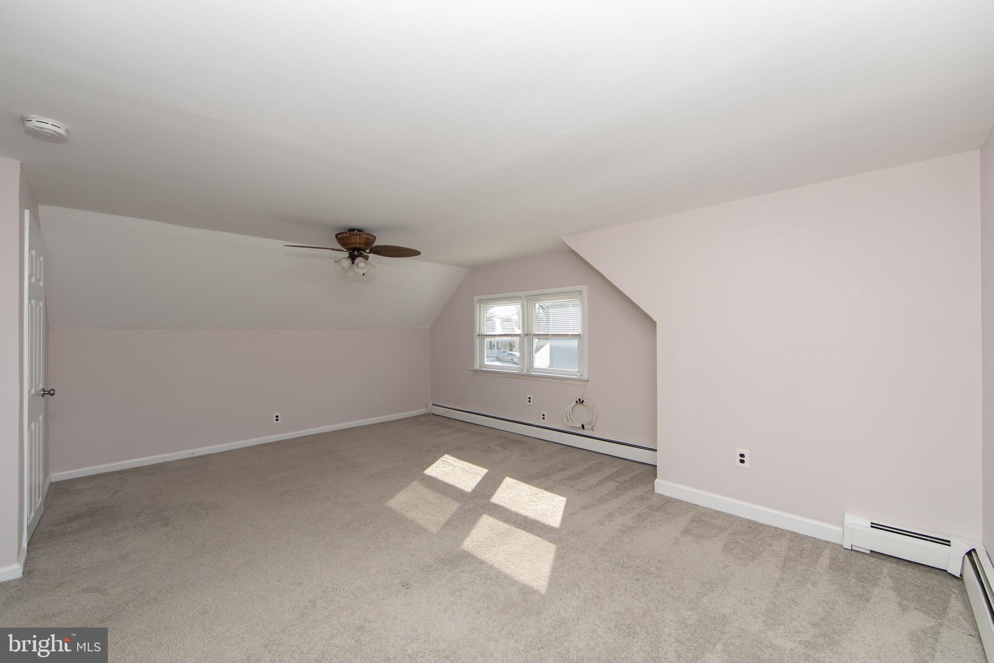 553 Maple Avenue Audubon, NJ 08106 - Photo 23 of 49 an empty room with windows