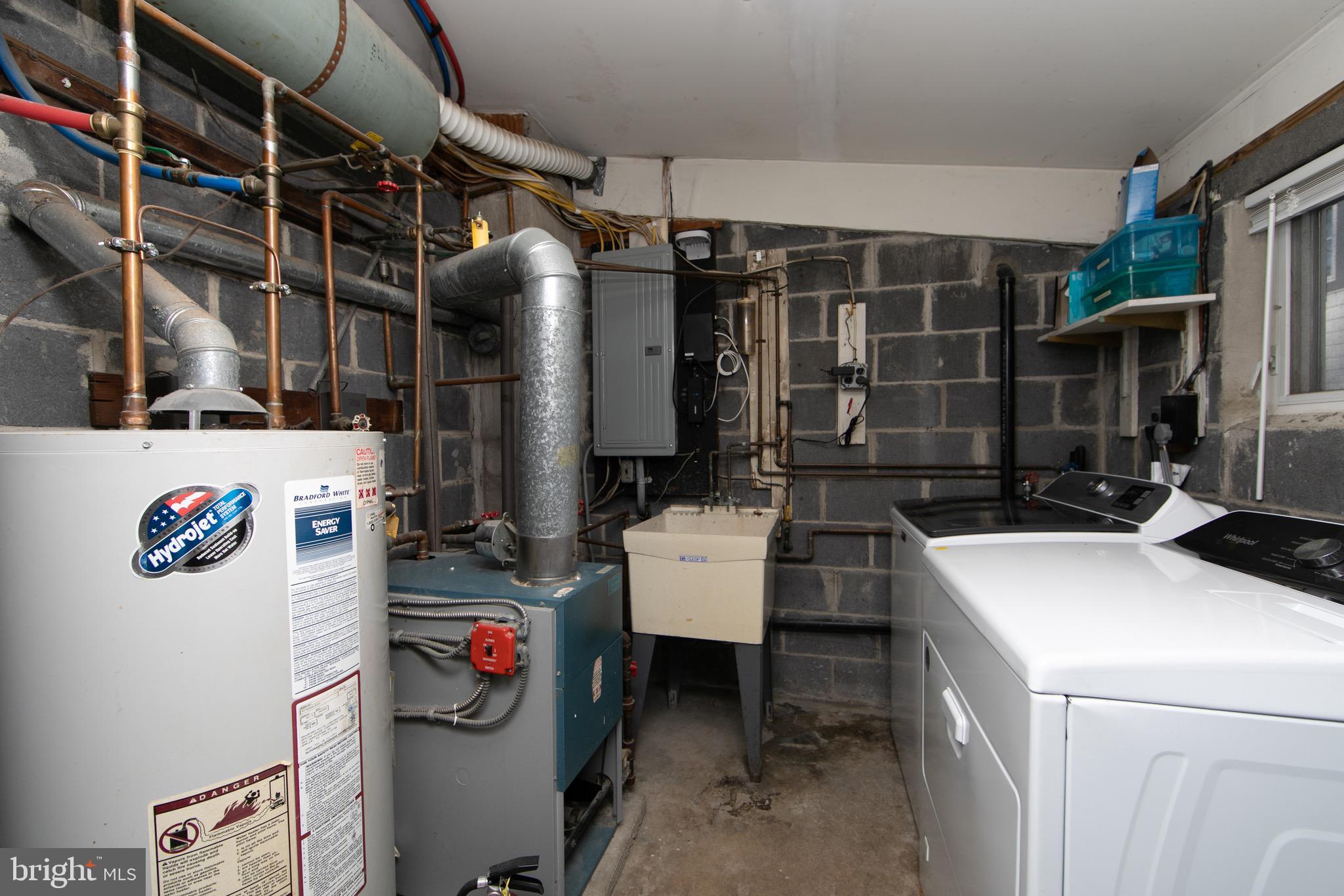 553 Maple Avenue Audubon, NJ 08106 - Photo 29 of 49 a utility room with dryer and washer