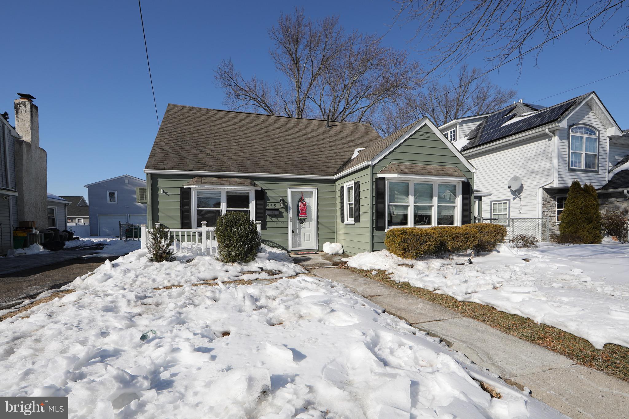 553 Maple Avenue Audubon, NJ 08106 - Photo 47 of 49 a front view of a house with a yard outdoor seating and barbeque oven