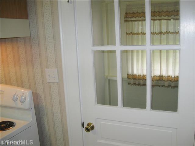 6080 Pine Hall Road Walnut Cove, NC 27052 - Photo 6 of 16 Other. The sun porch is off the kitchen and has a door to the outside.