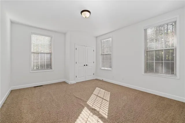 an empty room with windows