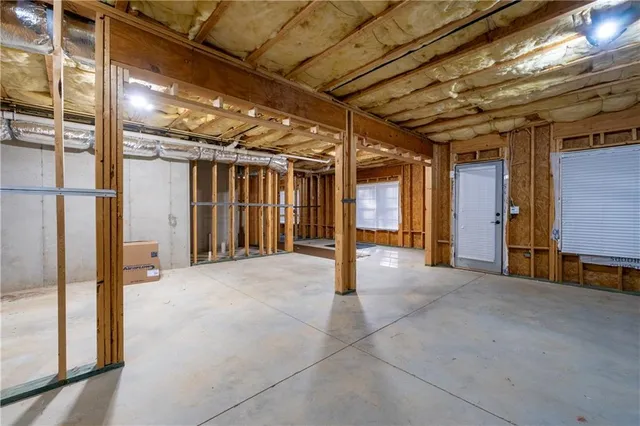 a view of deck with wooden floor and fence and trees