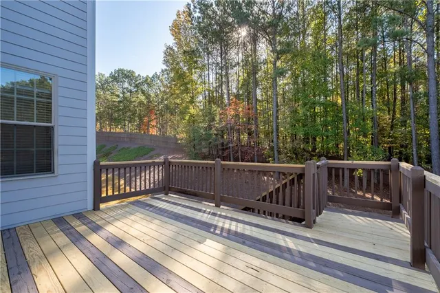 front view of a house with a large window