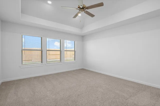 a bathroom with double sink and a mirror