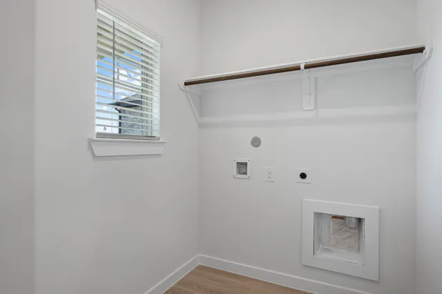 a view of a house with a yard and a garden