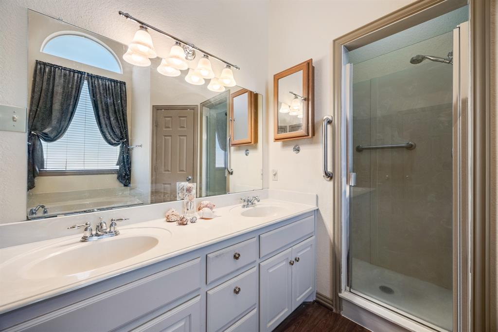 155 Lexington Drive Terrell, TX 75160 - Photo 16 of 27 a bathroom with a granite countertop sink mirror and double