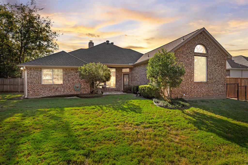 155 Lexington Drive Terrell, TX 75160 - Photo 24 of 27 a front view of a house with a yard