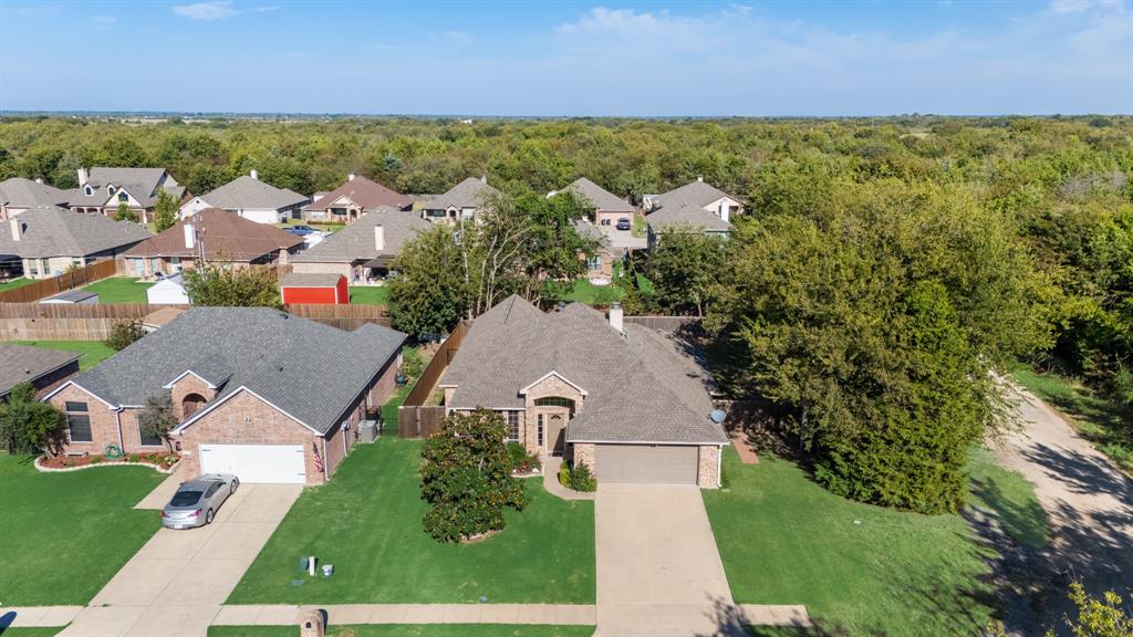 155 Lexington Drive Terrell, TX 75160 - Photo 27 of 27 an aerial view of a house with a garden