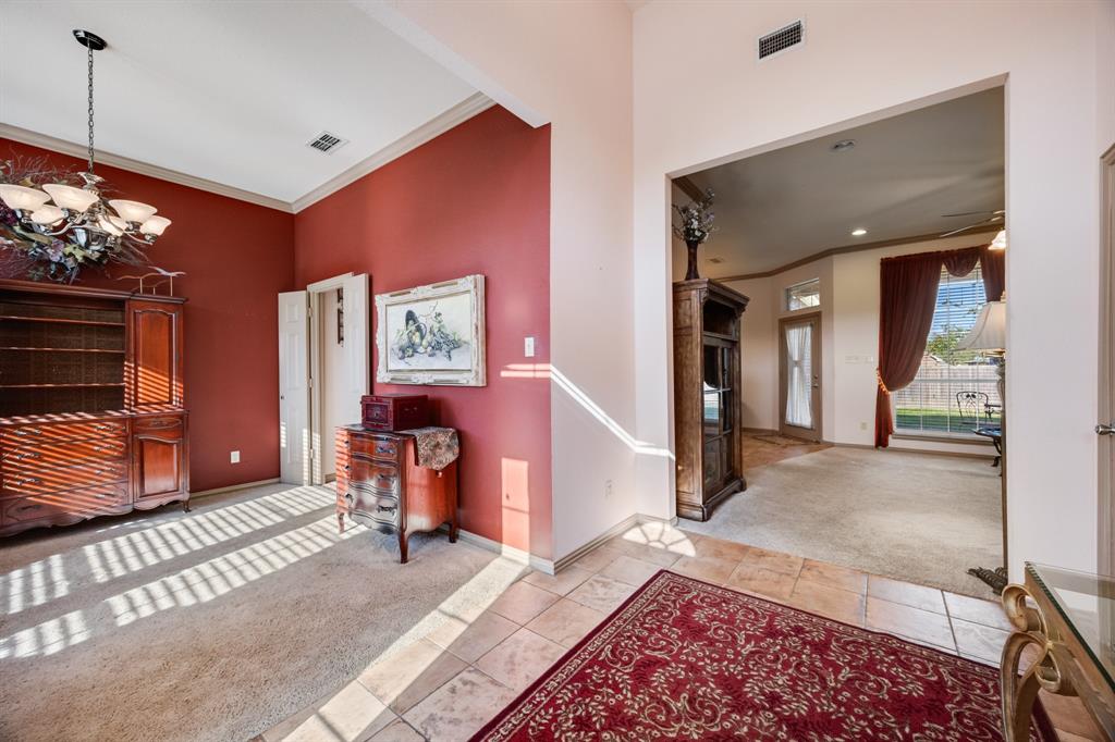 155 Lexington Drive Terrell, TX 75160 - Photo 4 of 27 a view of a livingroom with furniture and window