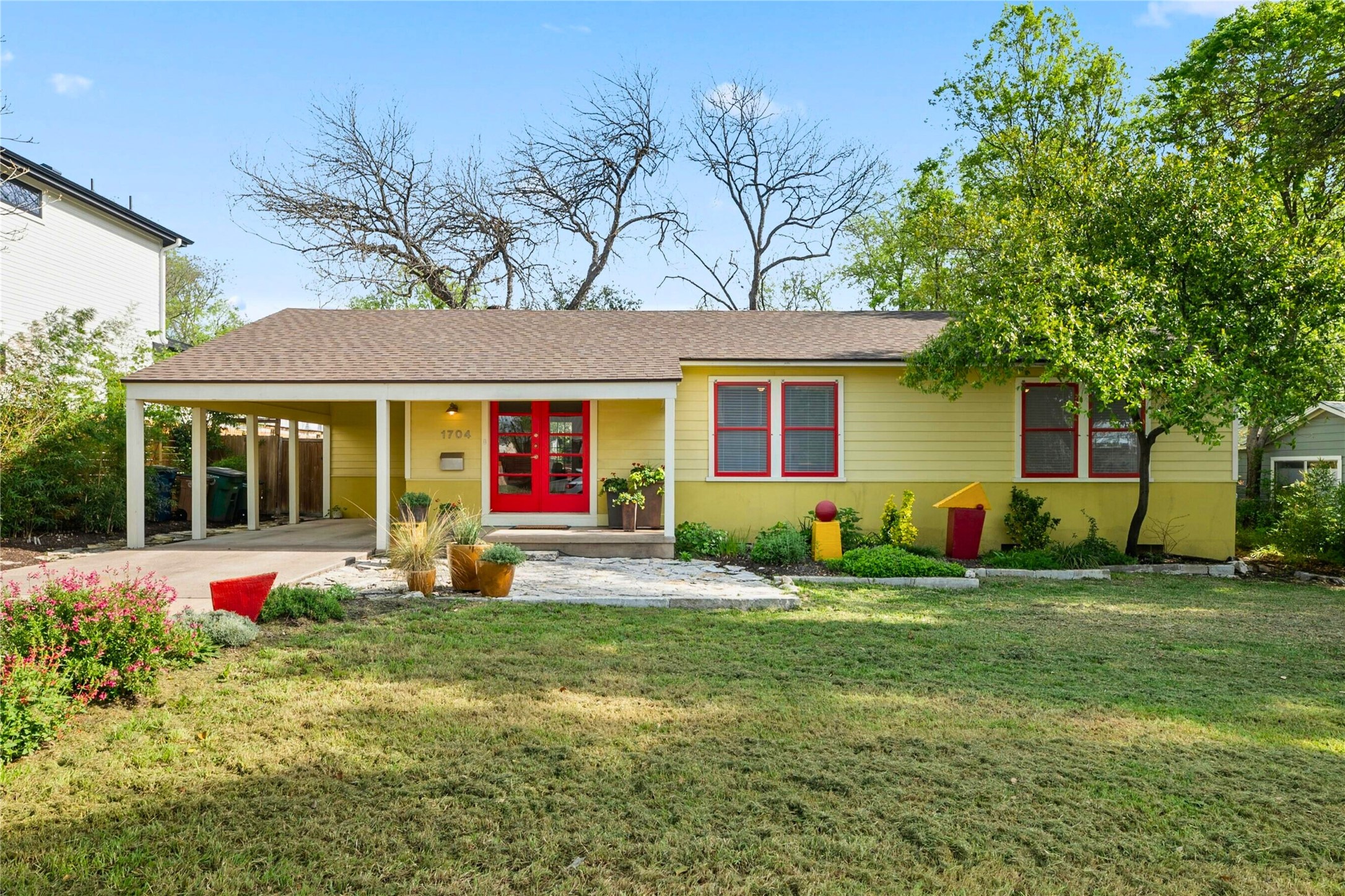 1704 Palo Duro Road Austin, TX 78757 - Photo 1 of 1 a front view of a house with porch and garden