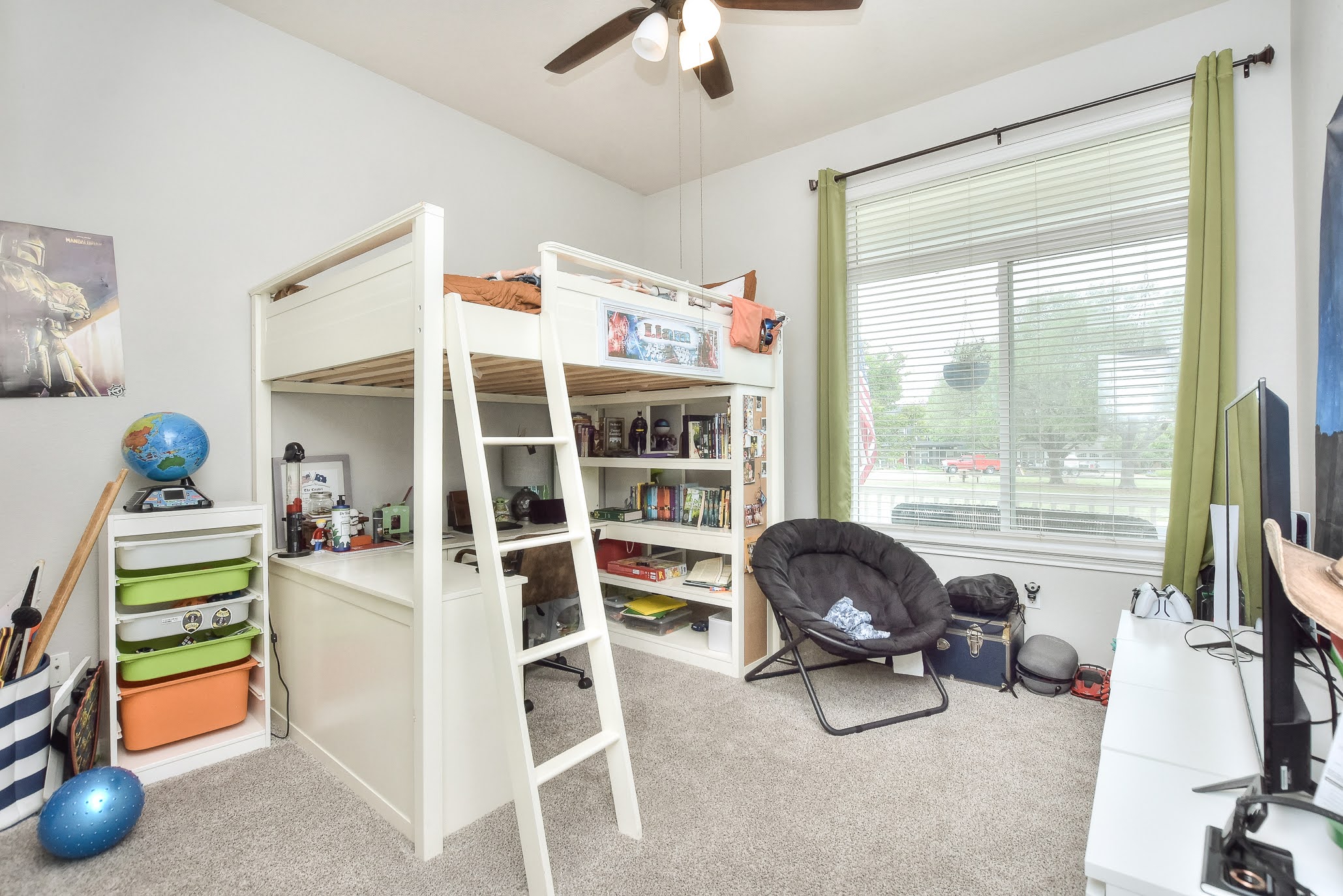 111 Green Grove Georgetown, TX 78633 - Photo 22 of 40 Bedroom featuring light carpet, ceiling fan, and a desk