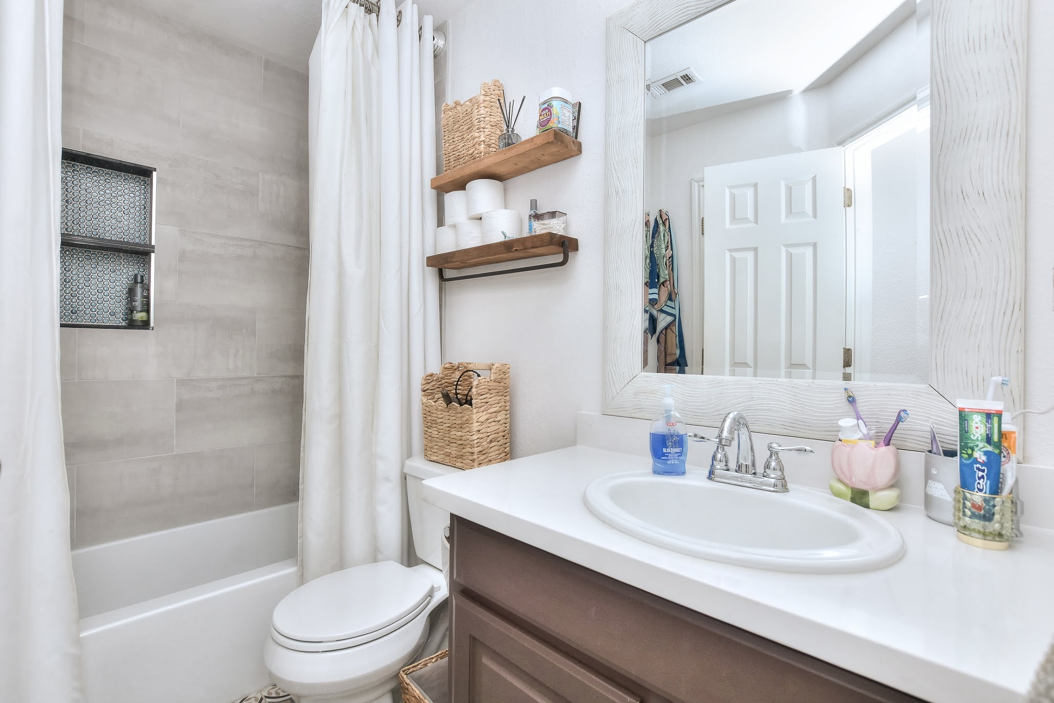111 Green Grove Georgetown, TX 78633 - Photo 24 of 40 Bathroom with vanity and shower / tub combo with curtain