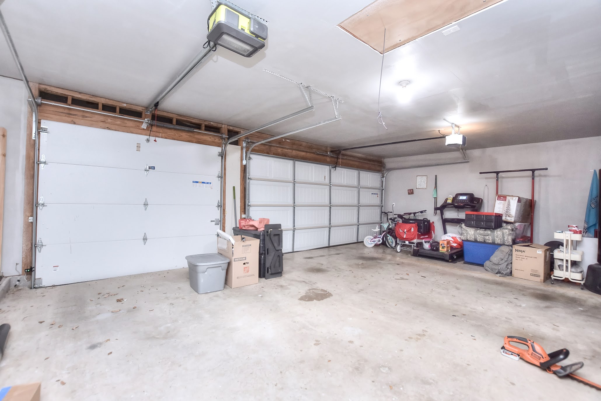 111 Green Grove Georgetown, TX 78633 - Photo 30 of 40 Three car garage with back alley access. One car garage is insulated.