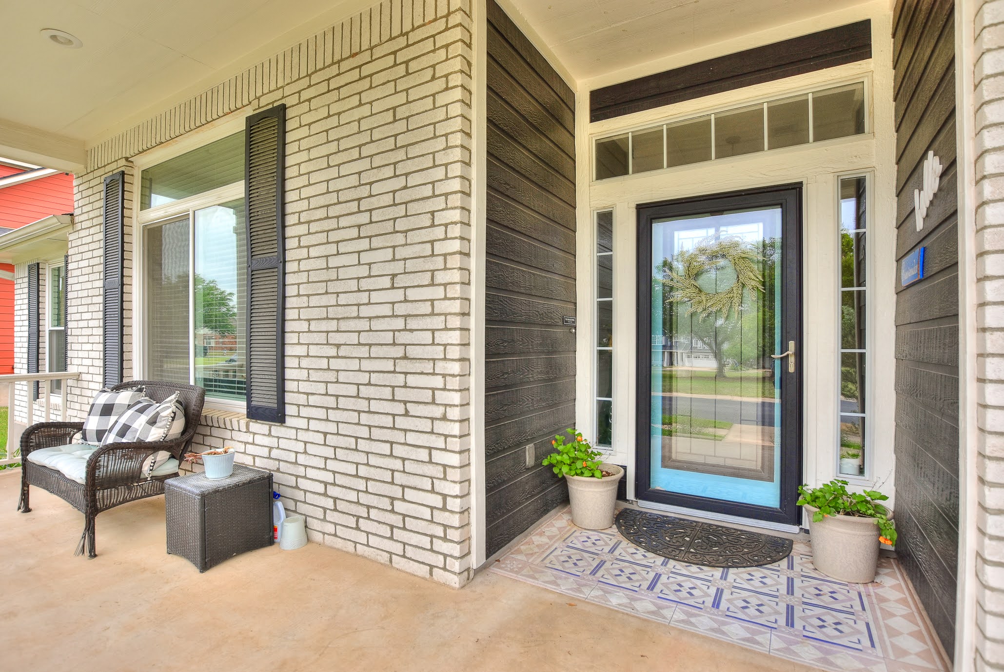 111 Green Grove Georgetown, TX 78633 - Photo 3 of 40 View of exterior entry featuring brick siding and covered porch