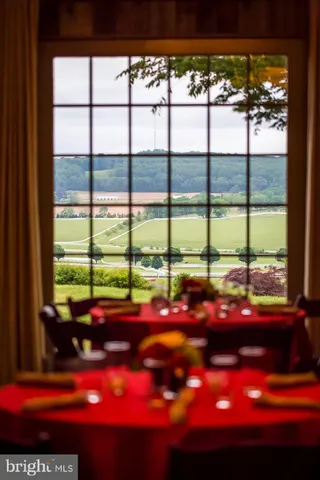 a front view of a house with swimming pool