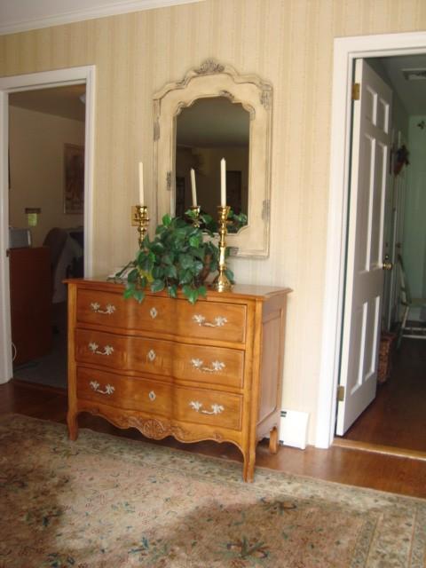 Undisclosed Address New Canaan, CT 06840 - Photo 13 of 14 a room with a dresser and a mirror