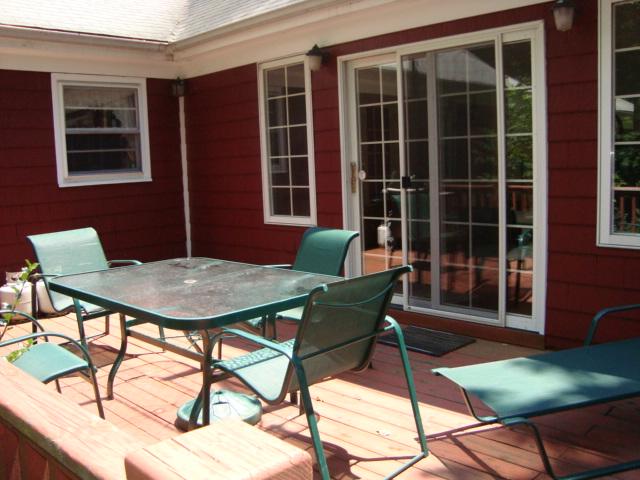 Undisclosed Address New Canaan, CT 06840 - Photo 7 of 14 a view of a house with backyard and sitting area