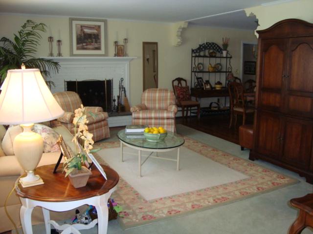 Undisclosed Address New Canaan, CT 06840 - Photo 10 of 14 a living room with furniture and a fireplace