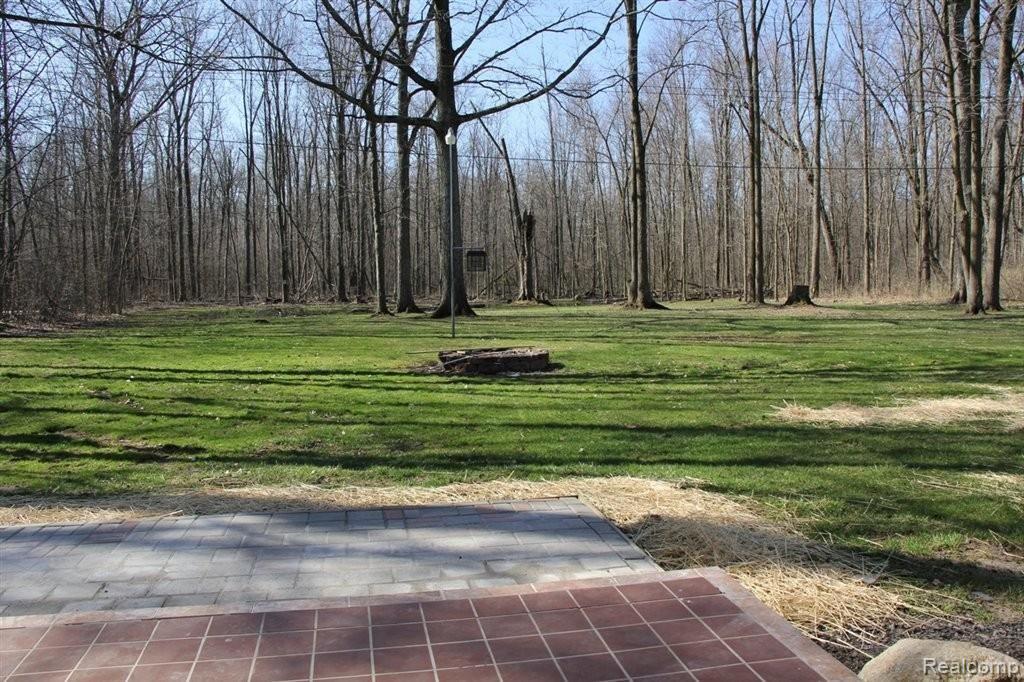 5360 Golf Club Road Howell, MI 48843 - Photo 5 of 19 Yard & Patio in Spring.JPG