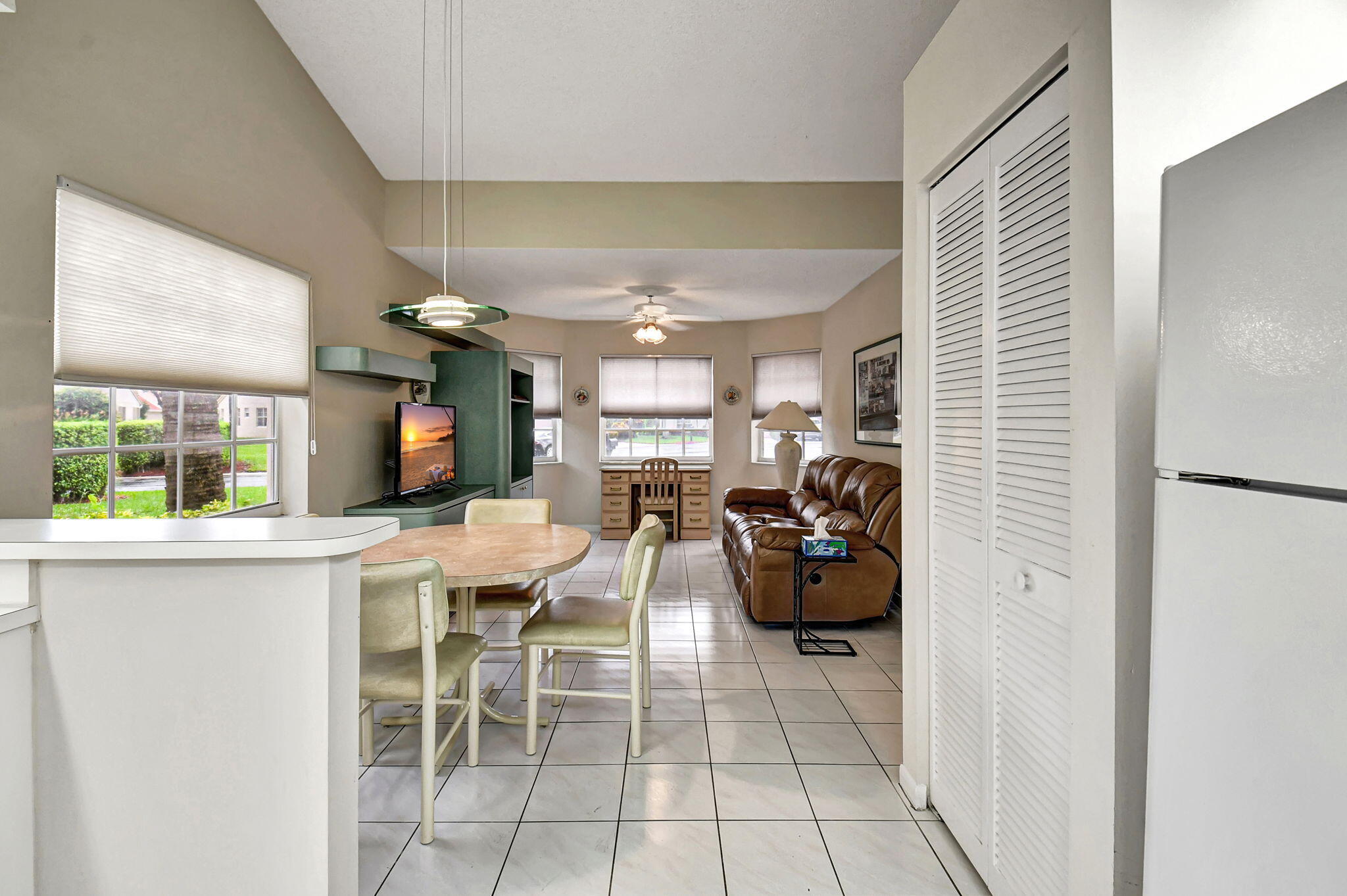 7921 Sandy Pointe Drive Delray Beach, FL 33446 - Photo 13 of 33 Kitchen out to Den