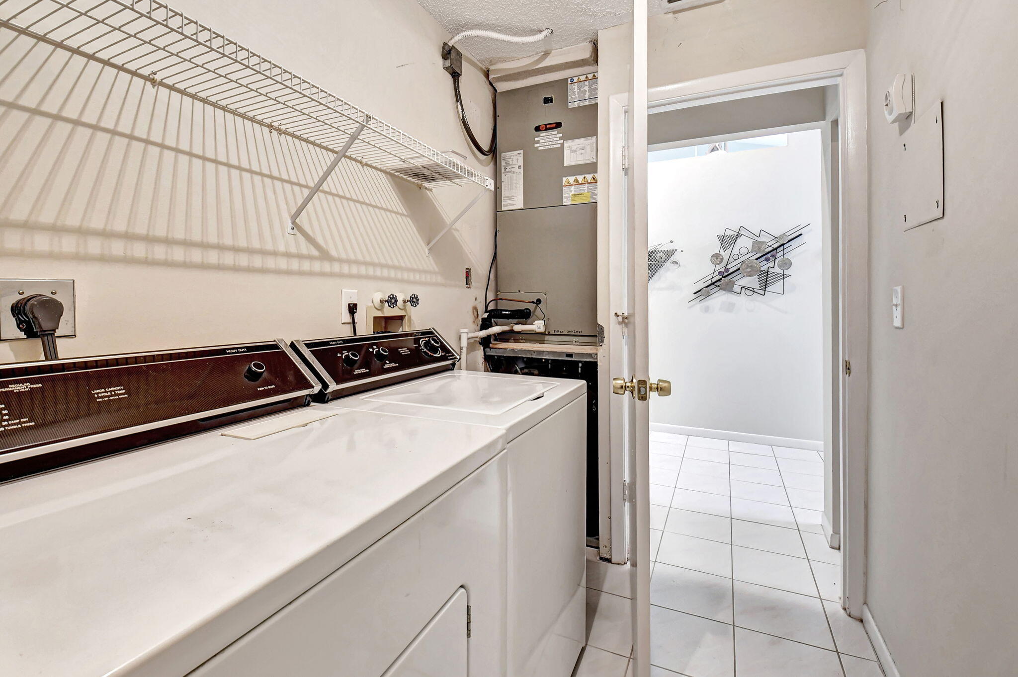 7921 Sandy Pointe Drive Delray Beach, FL 33446 - Photo 21 of 33 Interior Laundry