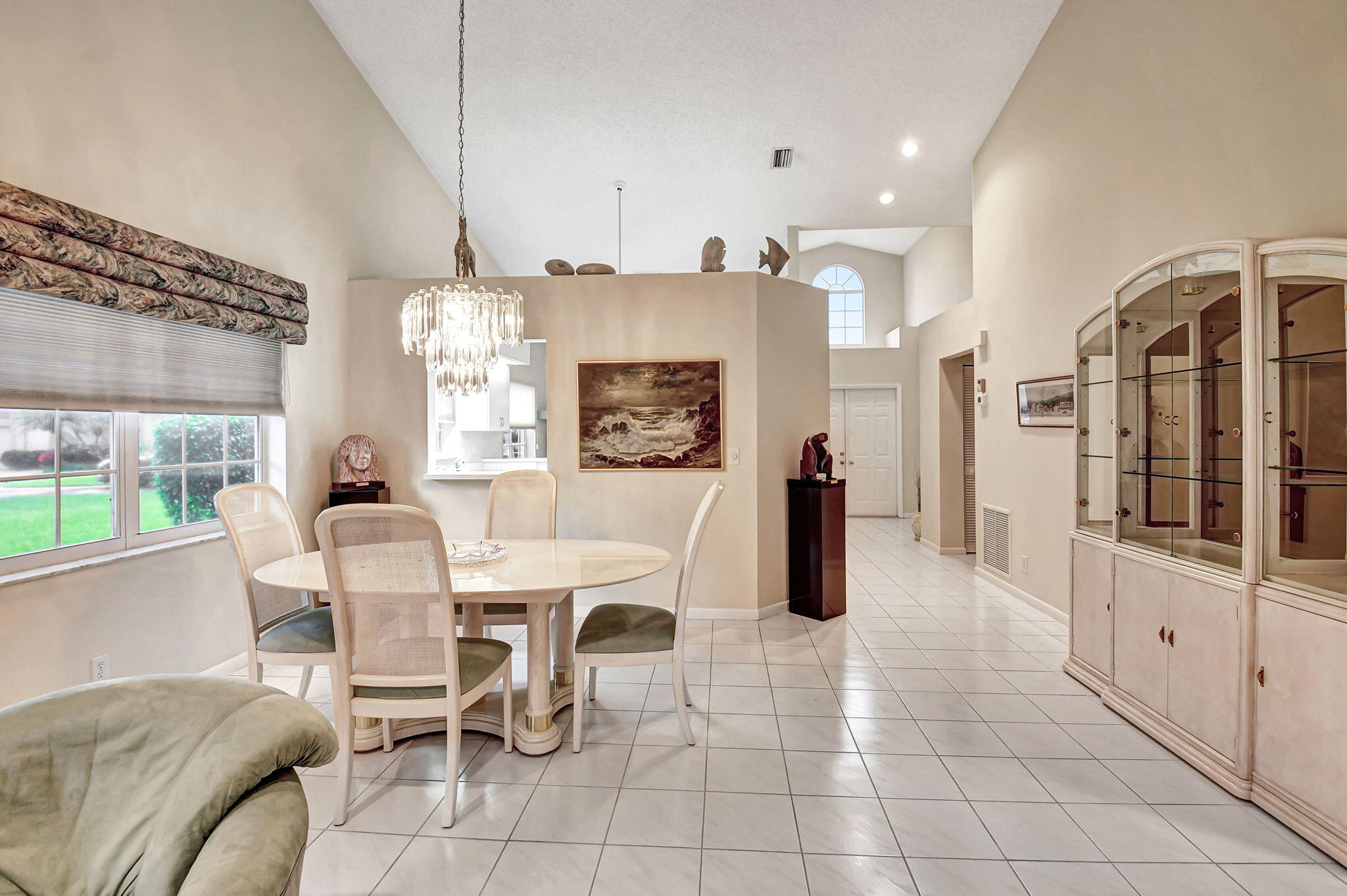7921 Sandy Pointe Drive Delray Beach, FL 33446 - Photo 7 of 33 Dining Room into Kitchen