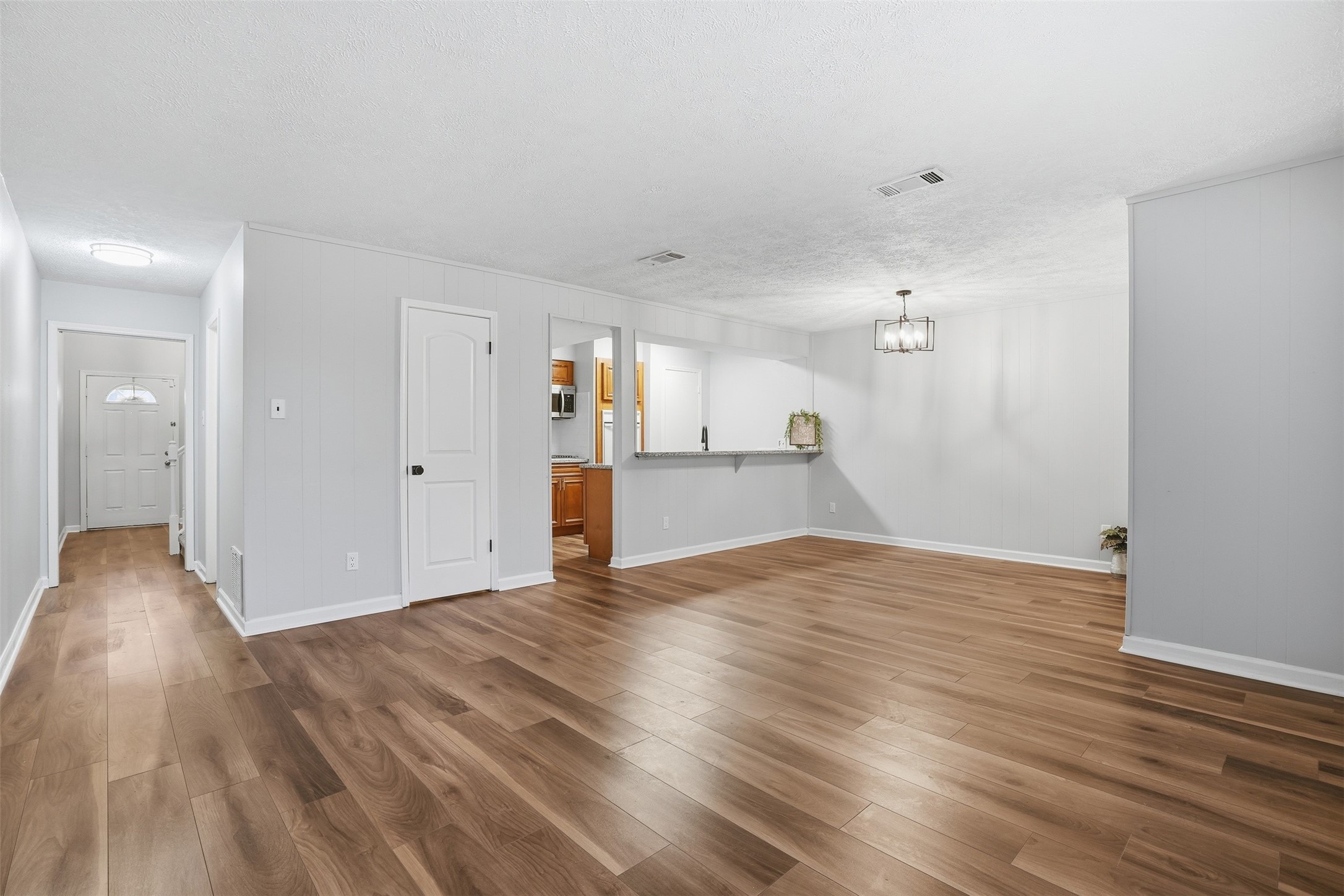 11647 Sabo Road Houston, TX 77089 - Photo 17 of 36 a view of empty room with wooden floor