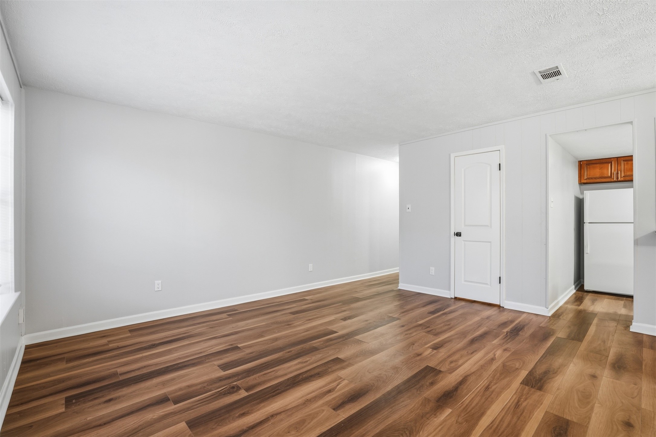 11647 Sabo Road Houston, TX 77089 - Photo 18 of 36 a view of room with wooden floor