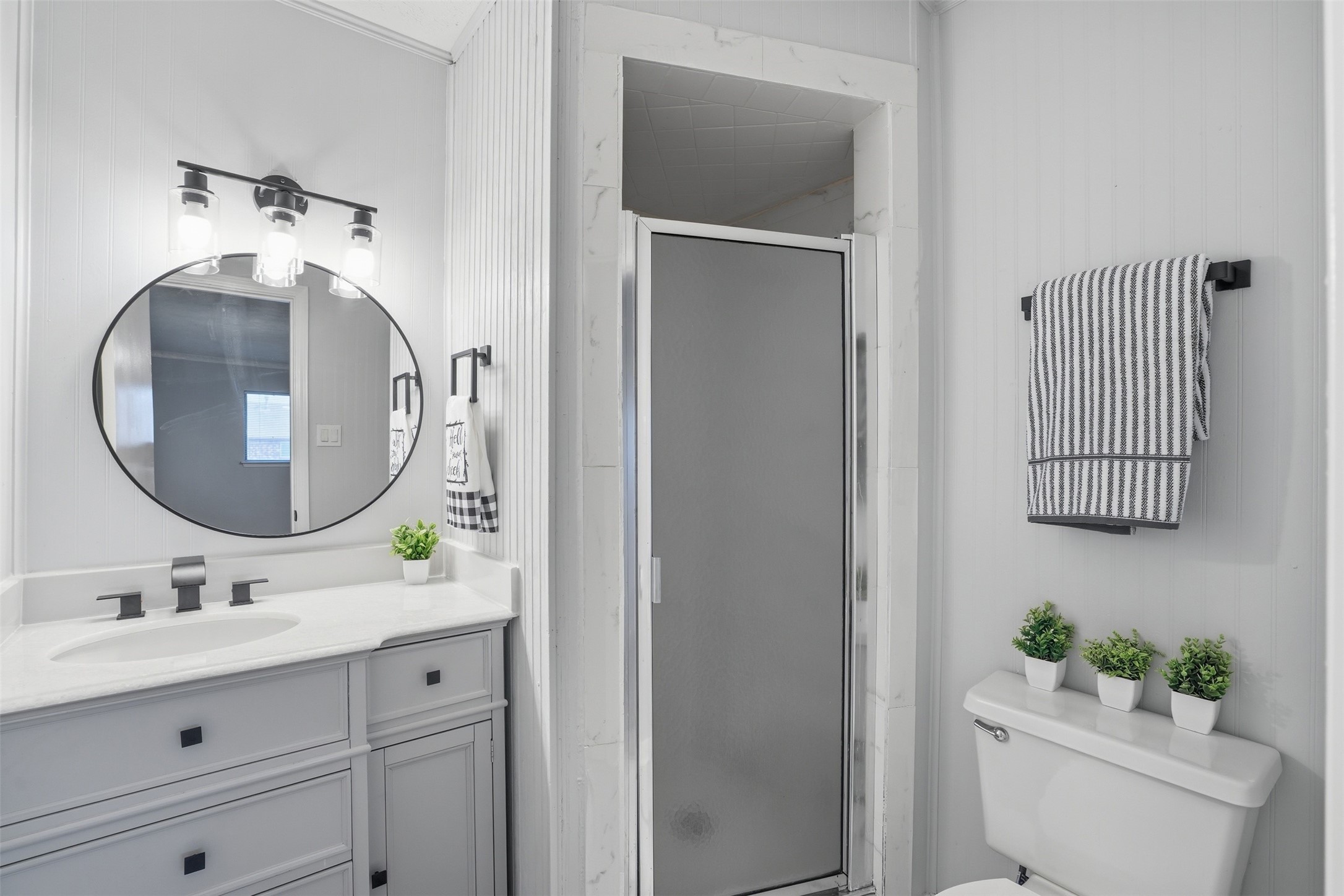 11647 Sabo Road Houston, TX 77089 - Photo 31 of 36 a bathroom with a toilet sink and mirror