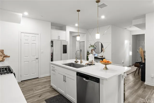a view of a sink and chandelier