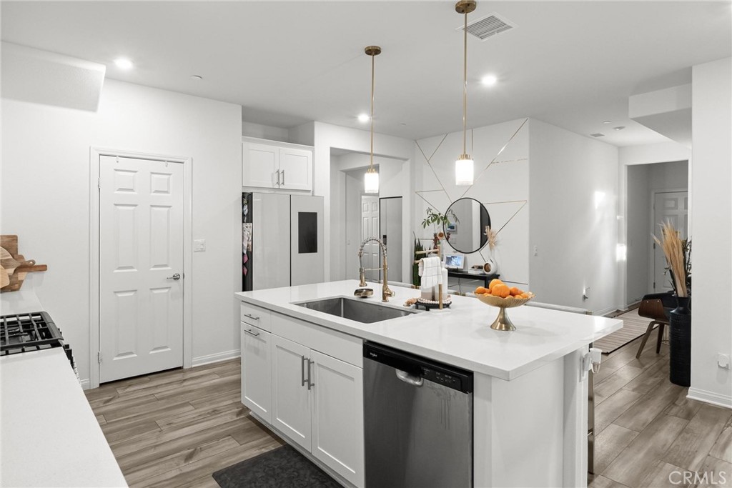 352 Alice Avenue Rialto, CA 92376 - Photo 15 of 41 a view of a sink and chandelier