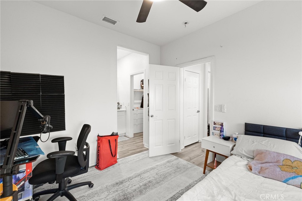 352 Alice Avenue Rialto, CA 92376 - Photo 21 of 41 a bedroom with furniture and a rug