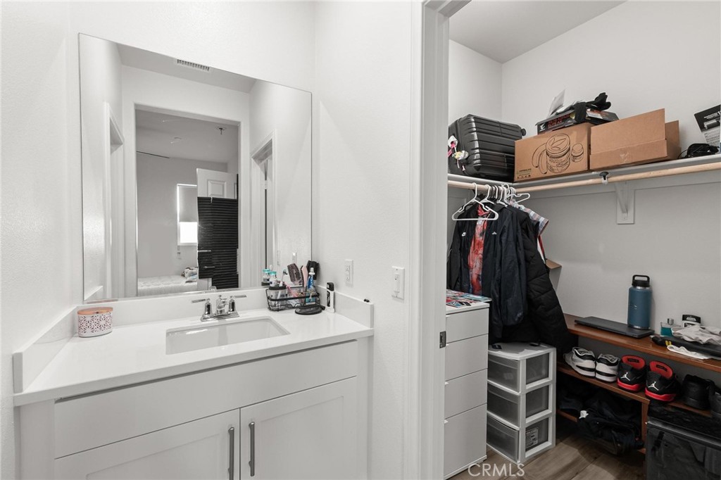352 Alice Avenue Rialto, CA 92376 - Photo 22 of 41 a bathroom with a sink and a mirror