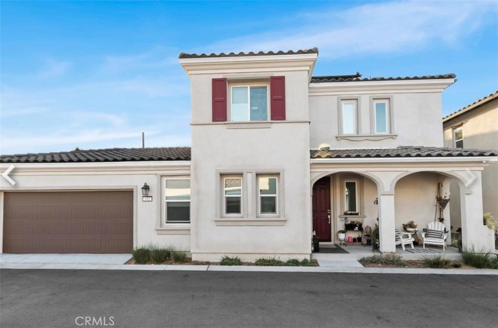 352 Alice Avenue Rialto, CA 92376 - Photo 3 of 41 a front view of a house with garage