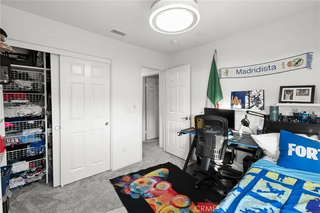 a view of a workspace with furniture and toys