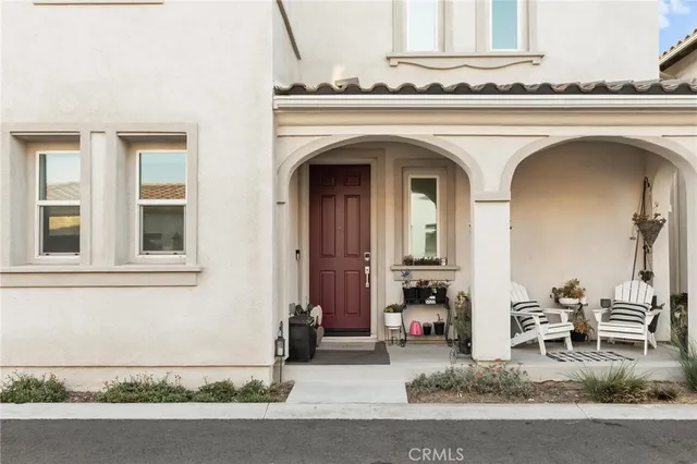 a front view of a house with garage