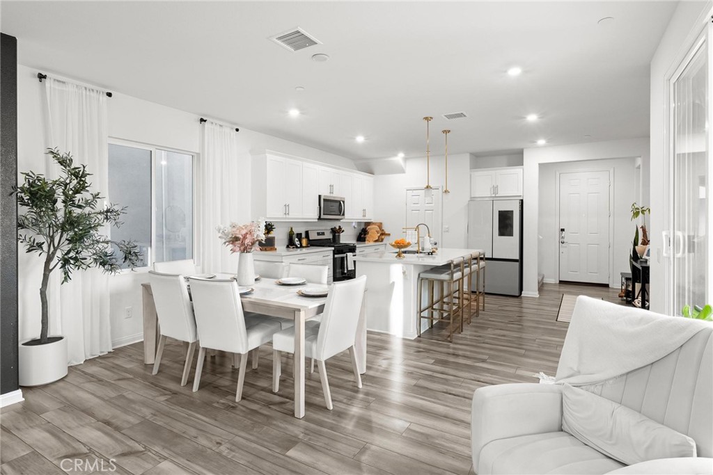 352 Alice Avenue Rialto, CA 92376 - Photo 8 of 41 a view of a dining room with furniture