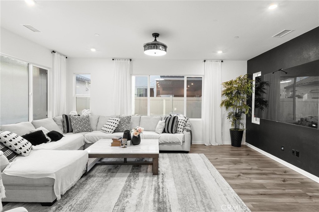 352 Alice Avenue Rialto, CA 92376 - Photo 9 of 41 a living room with furniture and a large window