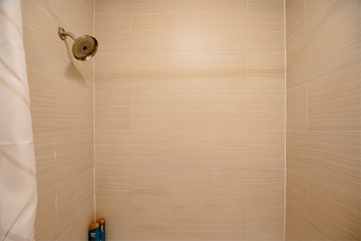 2603 Parker Lane, Unit B Austin, TX 78741 - Photo 28 of 40 a bathroom with a shower