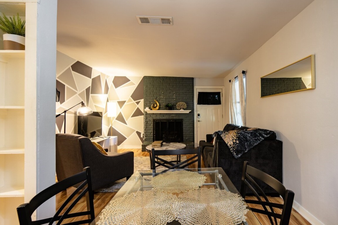 2603 Parker Lane, Unit B Austin, TX 78741 - Photo 7 of 40 a living room with furniture and a flat screen tv