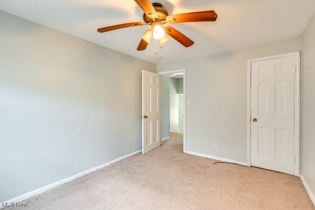 13677 Cedar Road Cleveland, OH 44118 - Photo 33 of 50 Unfurnished bedroom featuring carpet floors and ceiling fan