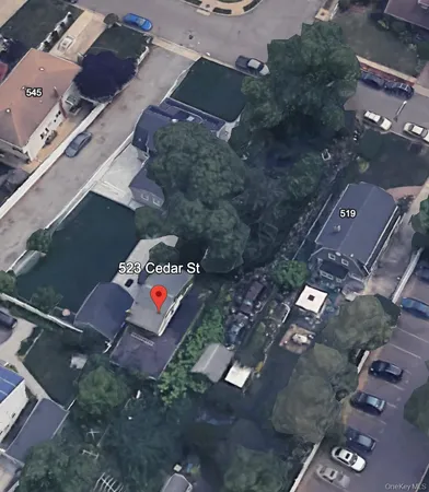 an aerial view of residential house with outdoor space