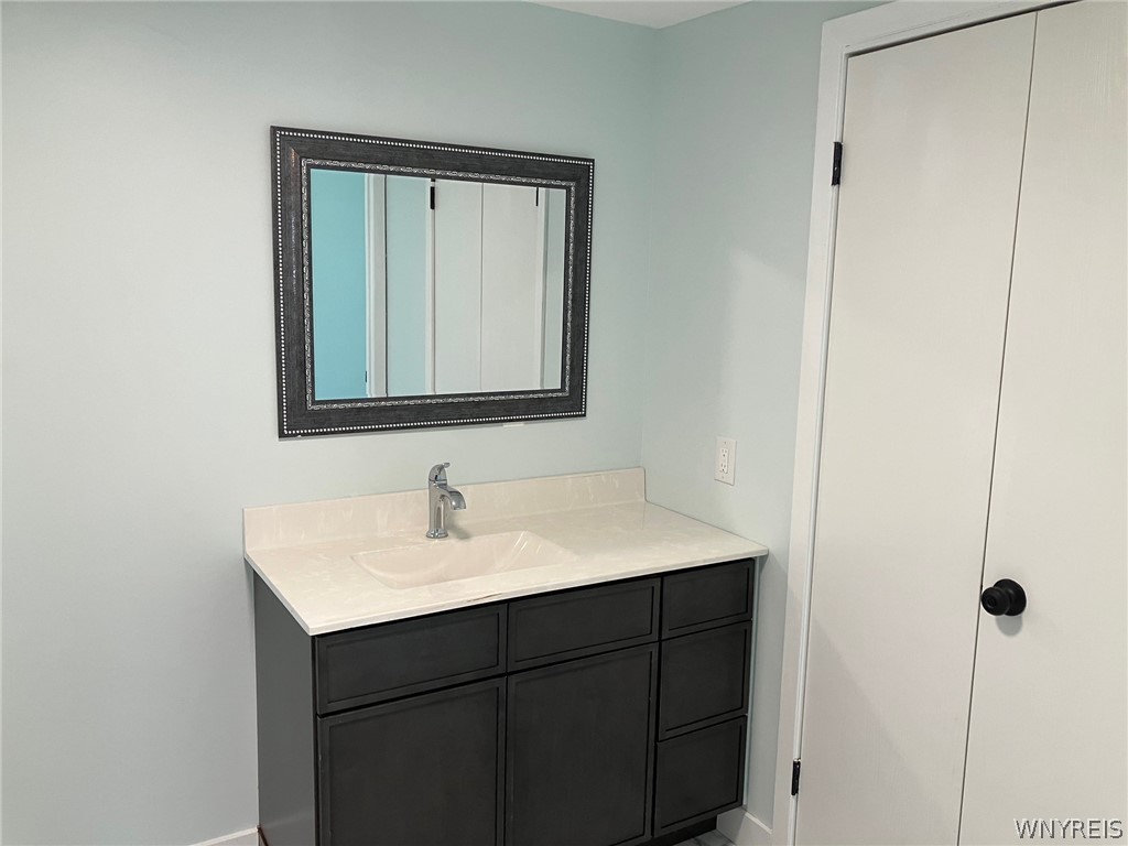 22 Genesee Street Perry, NY 14530 - Photo 14 of 19 Spacious bathroom with large closet