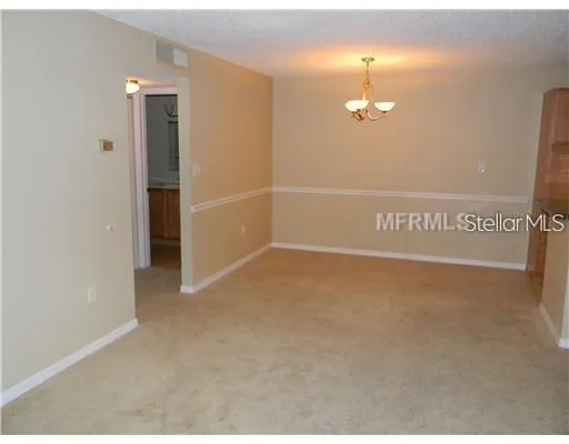 a view of a room with an empty space