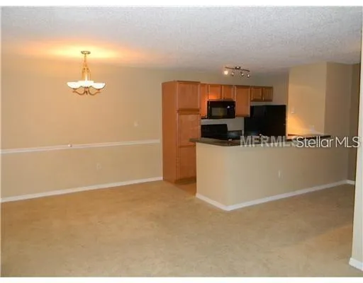 a view of a kitchen with a sink