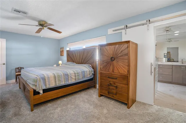 a bathroom with a double vanity sink and a