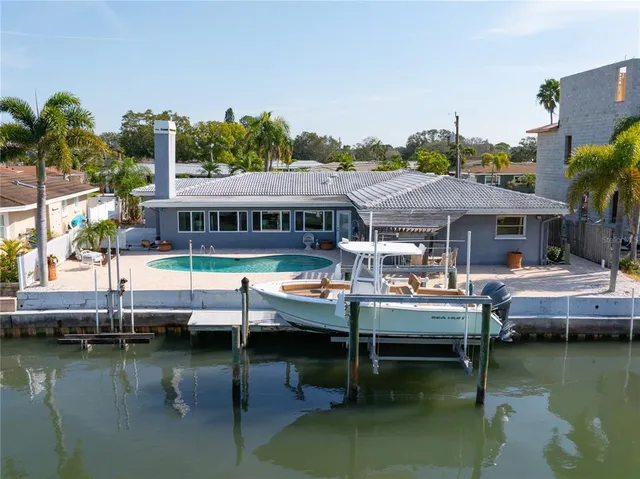 a view of a balcony with chairs
