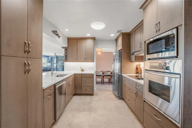 a spacious bathroom with a double vanity sink and a mirror