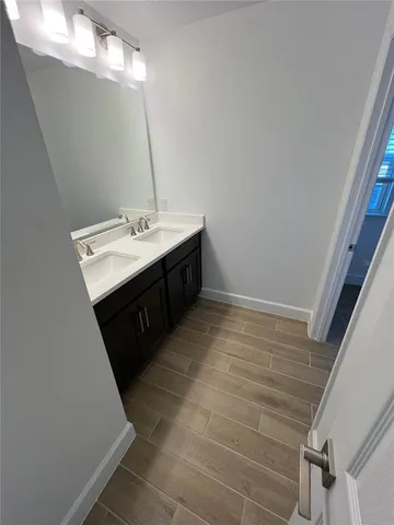 a bathroom with a toilet and a sink