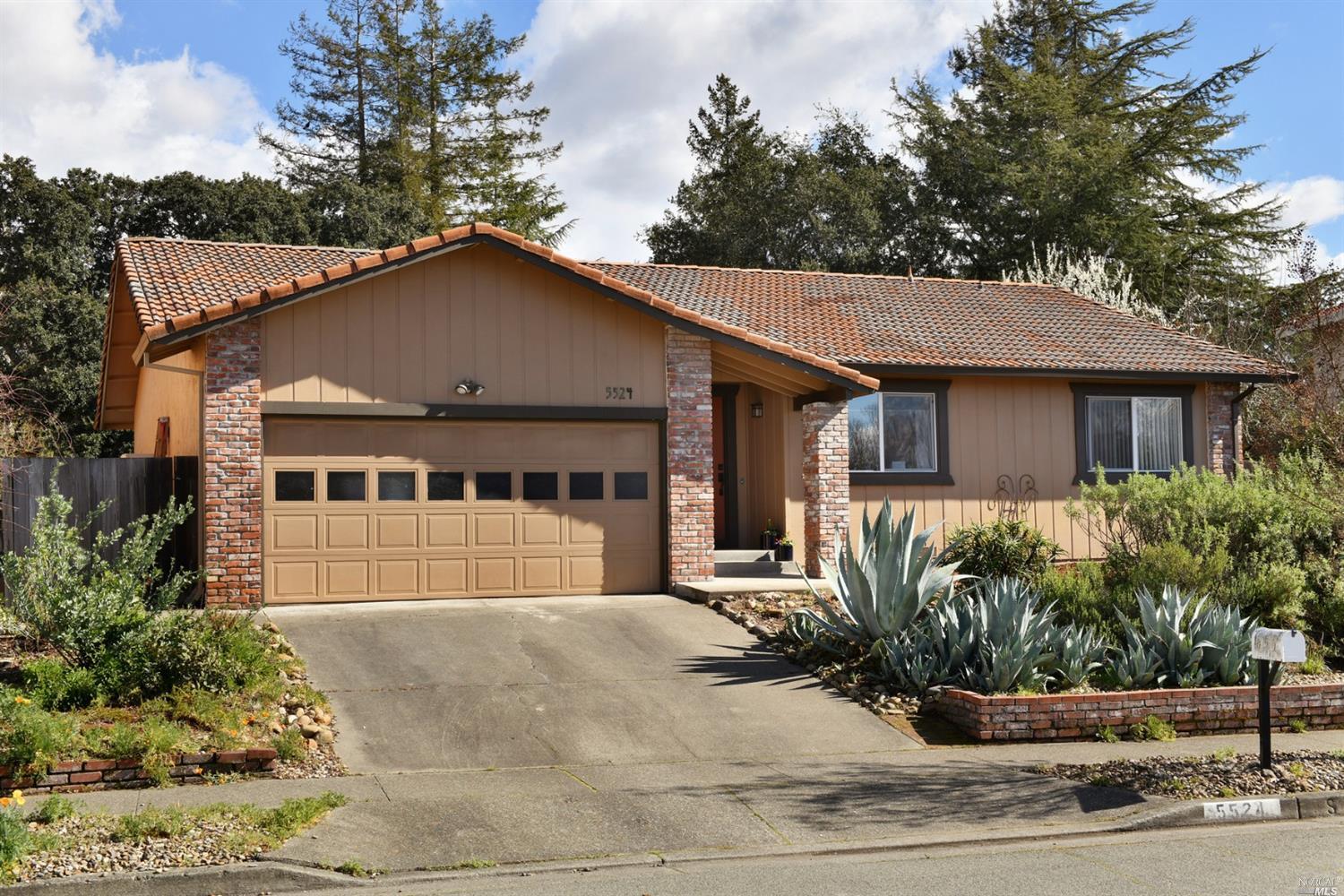 5524 Marit Drive Santa Rosa, CA 95409 - Photo 1 of 1 a front view of a house with a garden